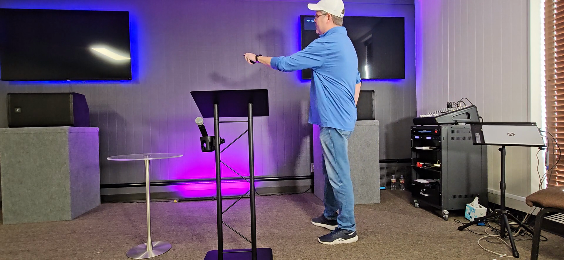 Step #22: Point the remote at the TVs and press the power button to turn them off.