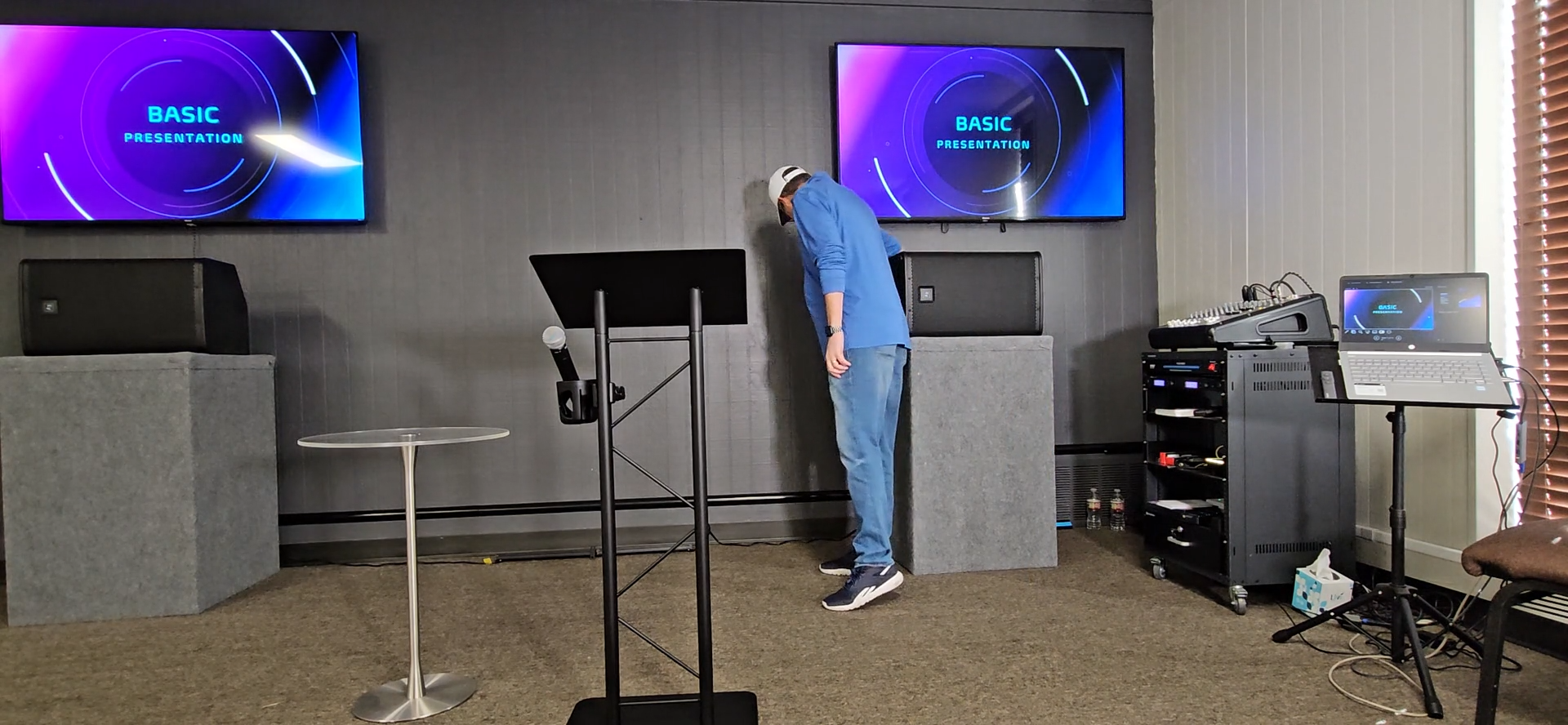 Step #12: Locate the two remote controls behind the speaker.