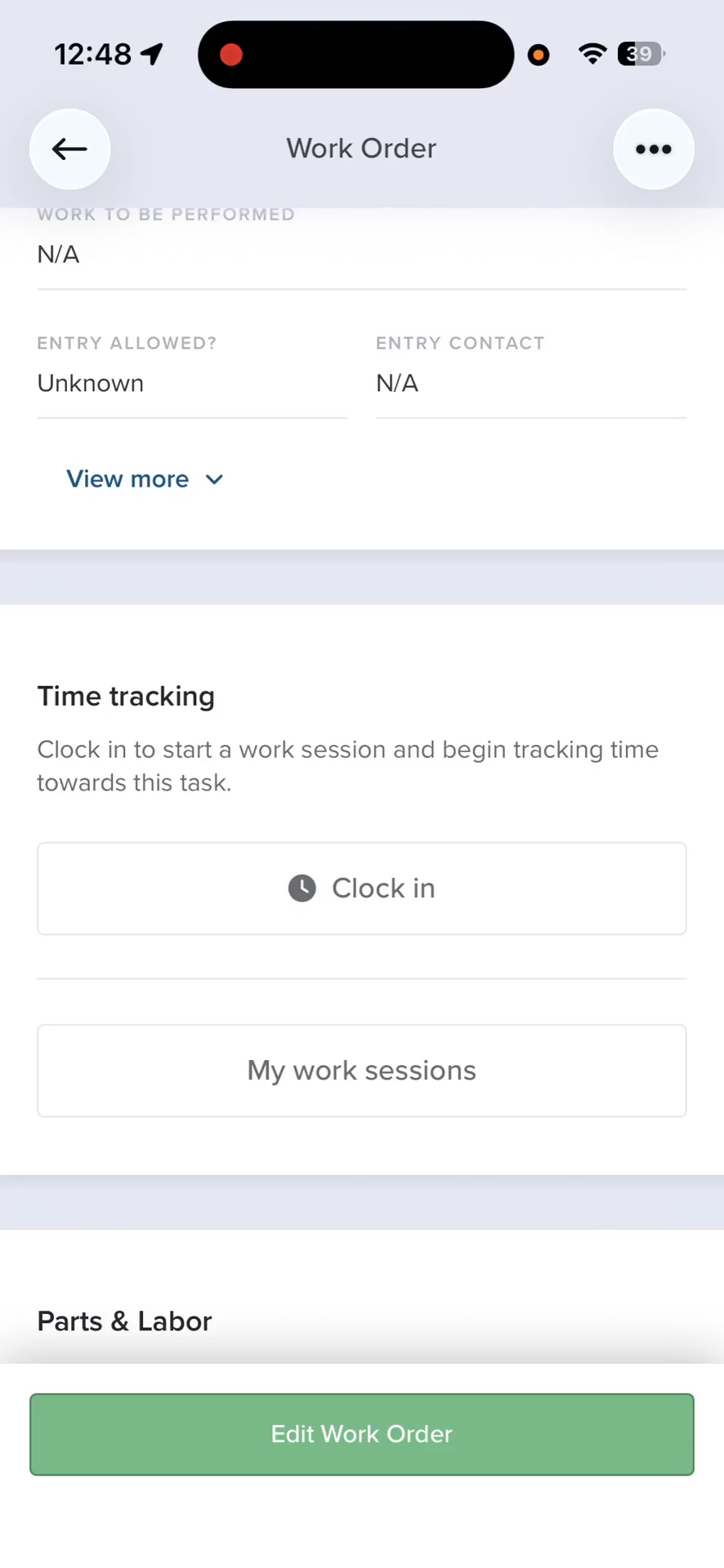 Step #4: Scroll down to the Time Tracking section and tap Clock in.