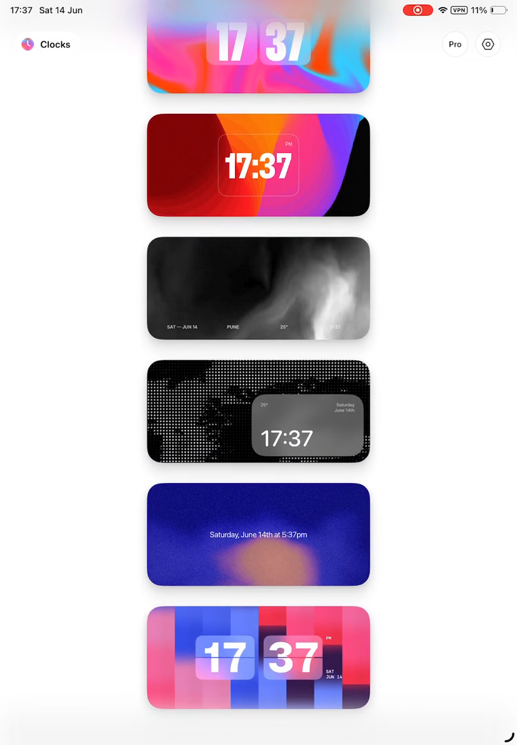 Step #1: Tap on the clock style displaying 'Saturday, June 14th at 5:37pm' from the vertical list of clocks.