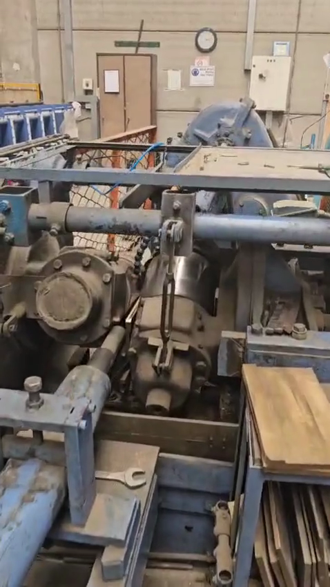 Step #3: Locate the wheels in the center of the machine.